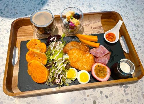 a tray of food on a table with a plate of food at 歸璞泊旅 Hotel Beore in Yuchi