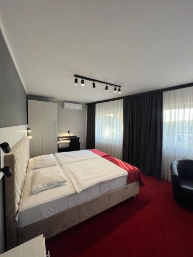 Postel nebo postele na pokoji v ubytování Hotel Olimp