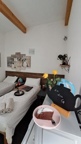 Ένα ή περισσότερα κρεβάτια σε δωμάτιο στο Bed & Breakfast Le Due G