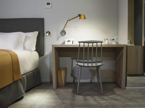 Katil atau katil-katil dalam bilik di Yurbban Trafalgar Hotel