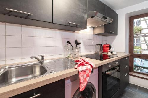 Køkken eller tekøkken på Centre Ville - L'évidence - Parking