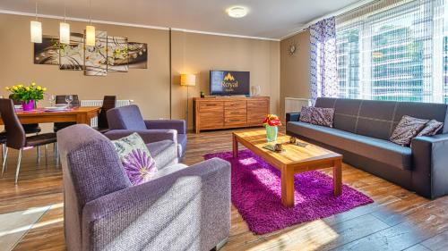 Χώρος καθιστικού στο Apartamenty 11-go 26 i 22 Listopada by Royal Aparts
