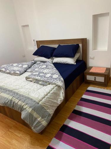 Postel nebo postele na pokoji v ubytování sheraton apartment