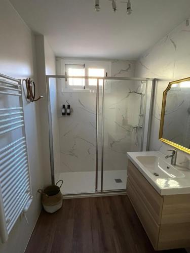 a bathroom with a shower and a sink at LA CASA DEL JAIME in Mora de Rubielos