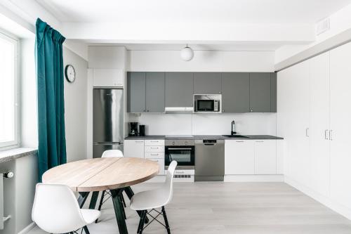 Una cocina o kitchenette en Spot Apartments Hyrylä