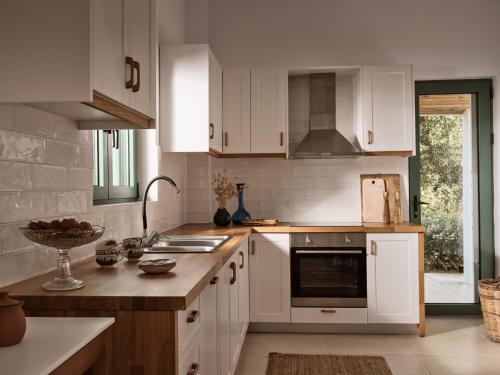 Kuchyňa alebo kuchynka v ubytovaní PHI Simple Living Quarters