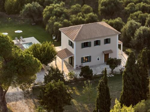 an aerial view of a house with a pool at PHI Simple Living Quarters in Akrotiri