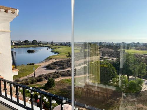 a view from a balcony with a view of a lake at Casa Estefania in Sucina