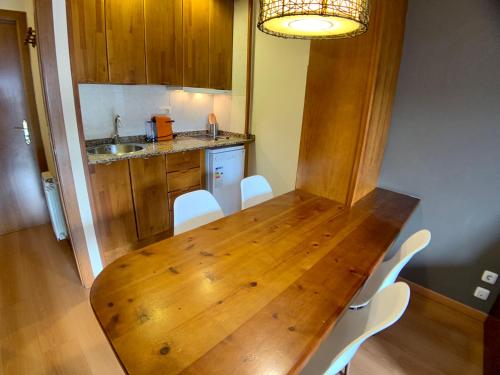 Dapur atau dapur kecil di Apartamentos Los Lagos