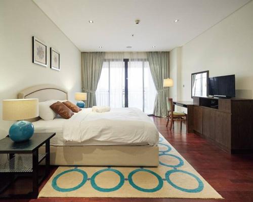Postel nebo postele na pokoji v ubytování Authentic 2 bdr in Anantara Resort Palm Jumeirah