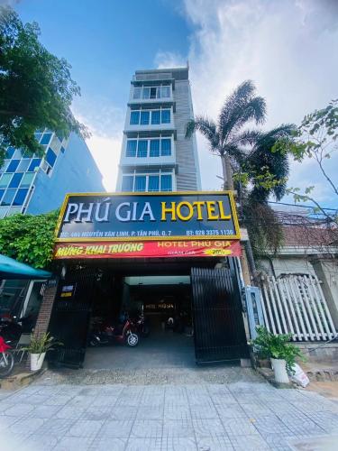 a hotel with a sign that reads ph chi la hotel at Phú Gia 464 NVL in Ho Chi Minh City