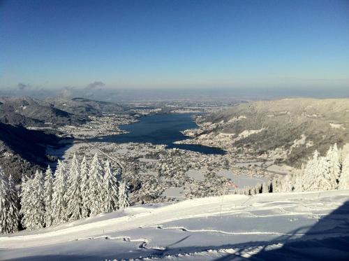 a view from the top of a snow covered mountain at Spa & Resort Bachmair Weissach, LUXURY FAMILY RESORT in Rottach-Egern