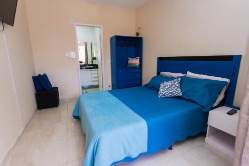 En eller flere senger på et rom på Otimo flat a 750m do mar Sta Monica Guarapari ES