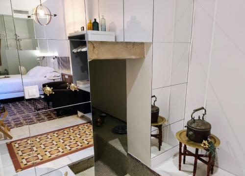 Ένα ή περισσότερα κρεβάτια σε δωμάτιο στο Hotel Madinat