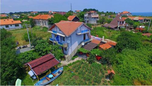 an overhead view of a house in a village at Villa Rezos in Rezovo