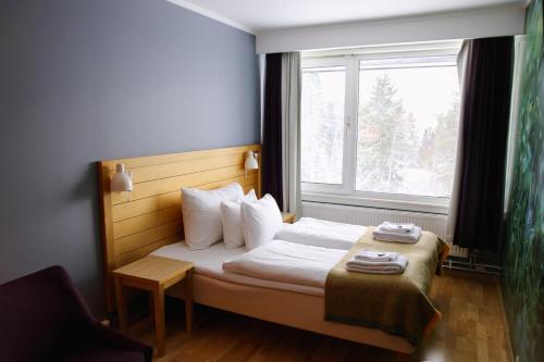 Кровать или кровати в номере Voksenasen Hotell; Best Western Signature Collection