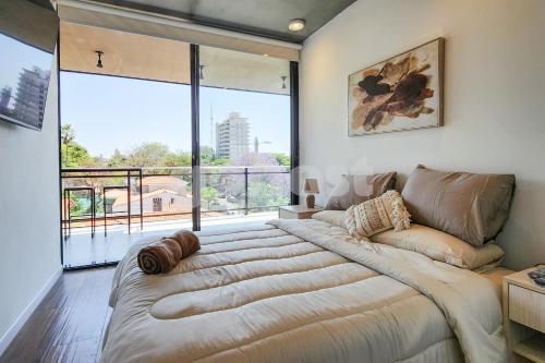 Ένα ή περισσότερα κρεβάτια σε δωμάτιο στο 2 Bedroom Apartment In Las Mercedes