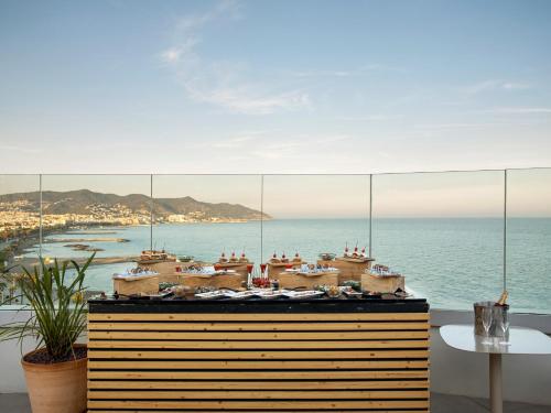 a room with a view of the ocean at ME Sitges Terramar in Sitges