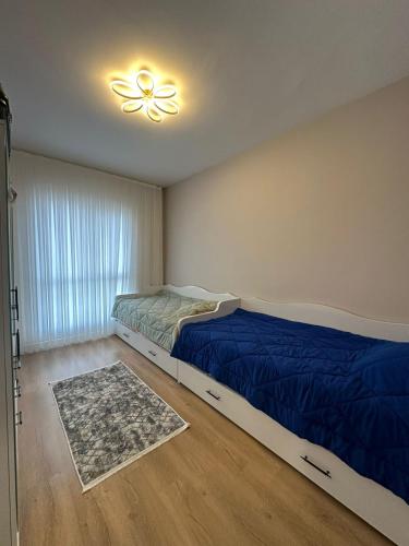 מיטה או מיטות בחדר ב-Ebruli 53