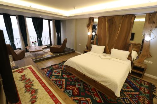 Postel nebo postele na pokoji v ubytování Hotel 1 Maji