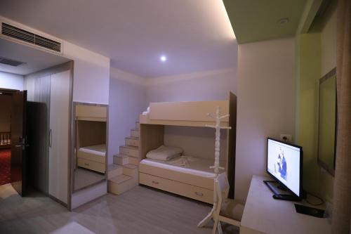 Cama o camas de una habitación en Hotel 1 Maji