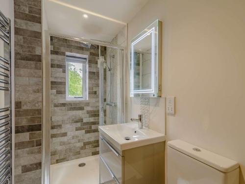 a bathroom with a sink and a shower at 2 Bed in Beverley 88422 in Lund