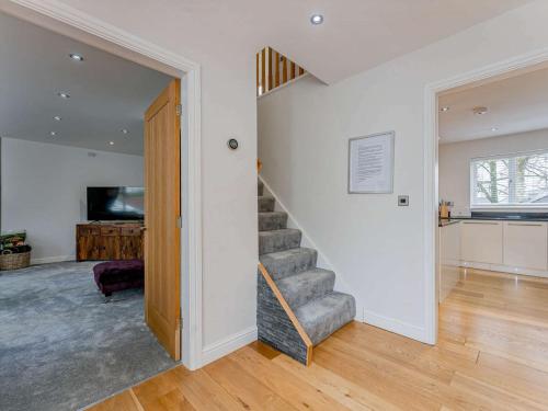 a stairway in a home with a stair case at 4 Bed in Penygroes 86423 in Pen-y-groes