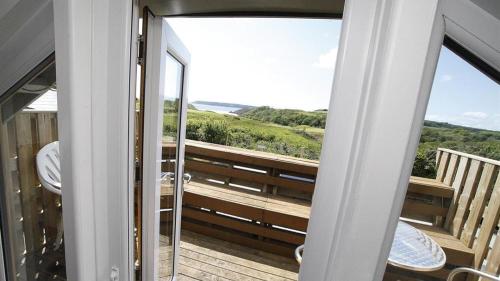 a view from the balcony of a house at Woodside in Parkmill