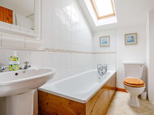 a white bathroom with a sink and a toilet at 2 Bed in Cerne Abbas BRAMC in Cerne Abbas