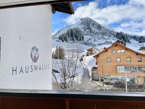 a view of the mountains from the window of a hotel at Haus Wallis by stayFritz - Ski-In Ski-Out Zimmer 'garni' am Arlberg in Warth am Arlberg