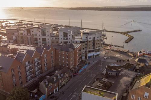 an overhead view of a city with a body of water at Coastal Cove in Poole
