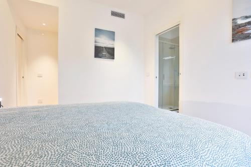 Postel nebo postele na pokoji v ubytování Porta di Mare Exclusive Seaview Terrace Flat