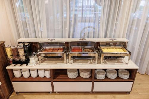 a food cart with some food on it at Green Wood Hotel & Spa in Bansko