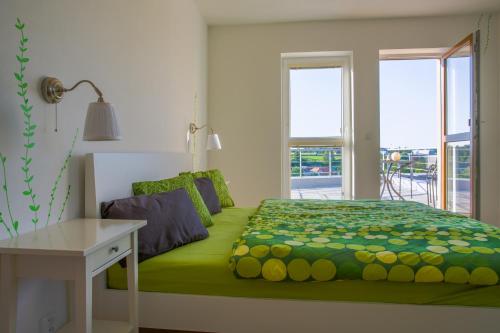 Postel nebo postele na pokoji v ubytování Apartment Zelená zahrada
