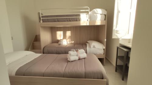 Una cama o camas en una habitación de La Torretta