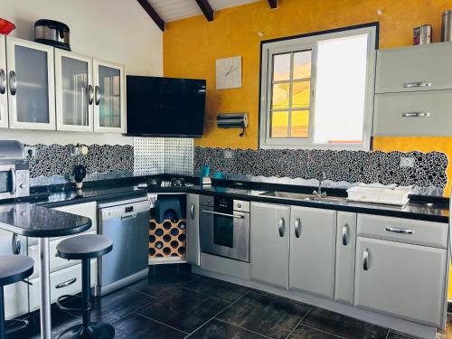 Kuchyň nebo kuchyňský kout v ubytování Villa Caraibes