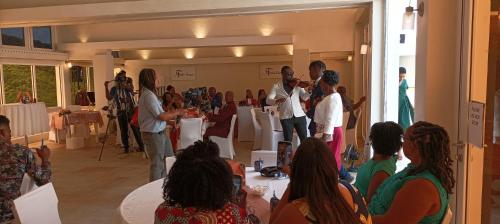 a group of people standing in a room at Spring Hotel Bequia in Port Elizabeth