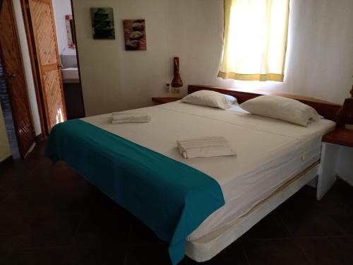Cama o camas de una habitación en Casasol_mancora