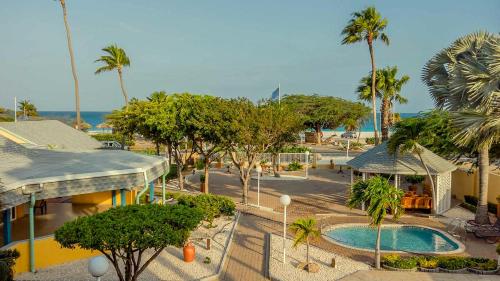 an aerial view of a resort with a swimming pool at MVC Eagle Beach in Palm-Eagle Beach