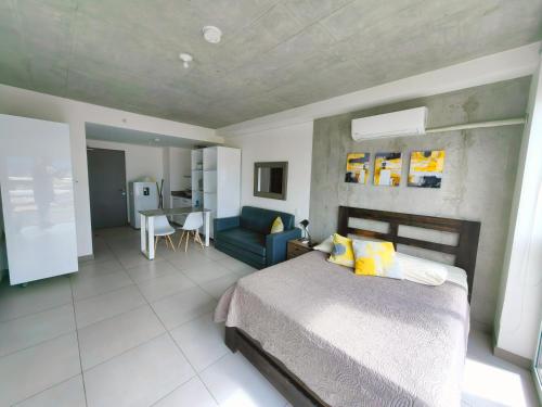 Ein Bett oder Betten in einem Zimmer der Unterkunft 0509 iFreses Hermoso Apartamento con Aire Acondicionado y Parqueo