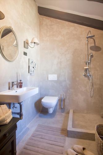 a bathroom with a sink and a toilet at Charming villa in Radetići in Tinjan