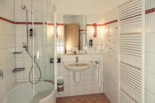 Kúpeľňa v ubytovaní Apartmenthaus SportCHALET
