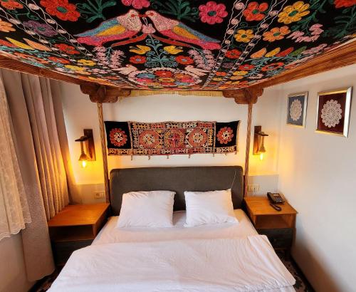 Ένα ή περισσότερα κρεβάτια σε δωμάτιο στο Marmara Guesthouse