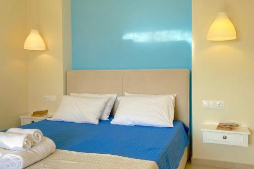 Katil atau katil-katil dalam bilik di Nissaki Suite Artemis Apartment by Sealand Villas