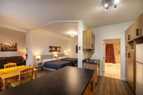 Dapur atau dapur kecil di Motel Et Condo Chez Charley