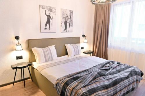 Postel nebo postele na pokoji v ubytování Marand Boutique Apartments