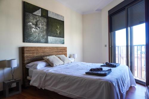 Postel nebo postele na pokoji v ubytování City Center Modern Apartment