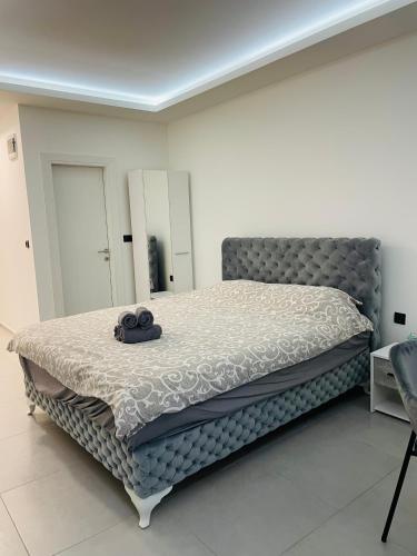 Ένα ή περισσότερα κρεβάτια σε δωμάτιο στο Luxury Centar