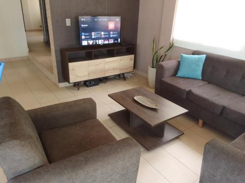 Телевизор и/или развлекательный центр в Linda casa de campo con todas las comodidades de la ciudad