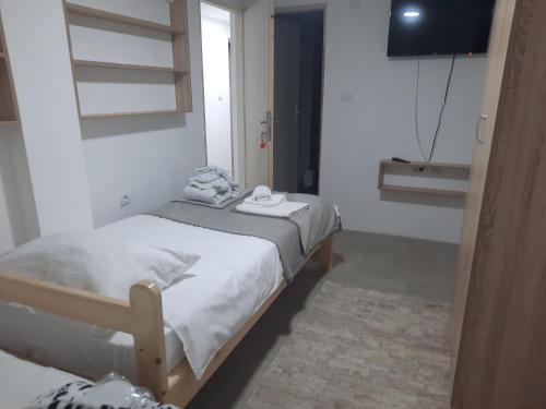 Postel nebo postele na pokoji v ubytování Kladenče